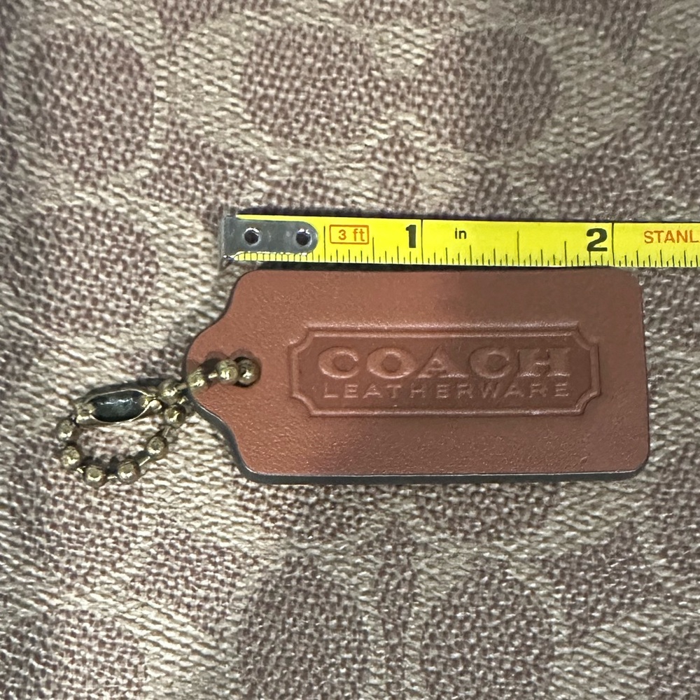 Coach saddle hangtag